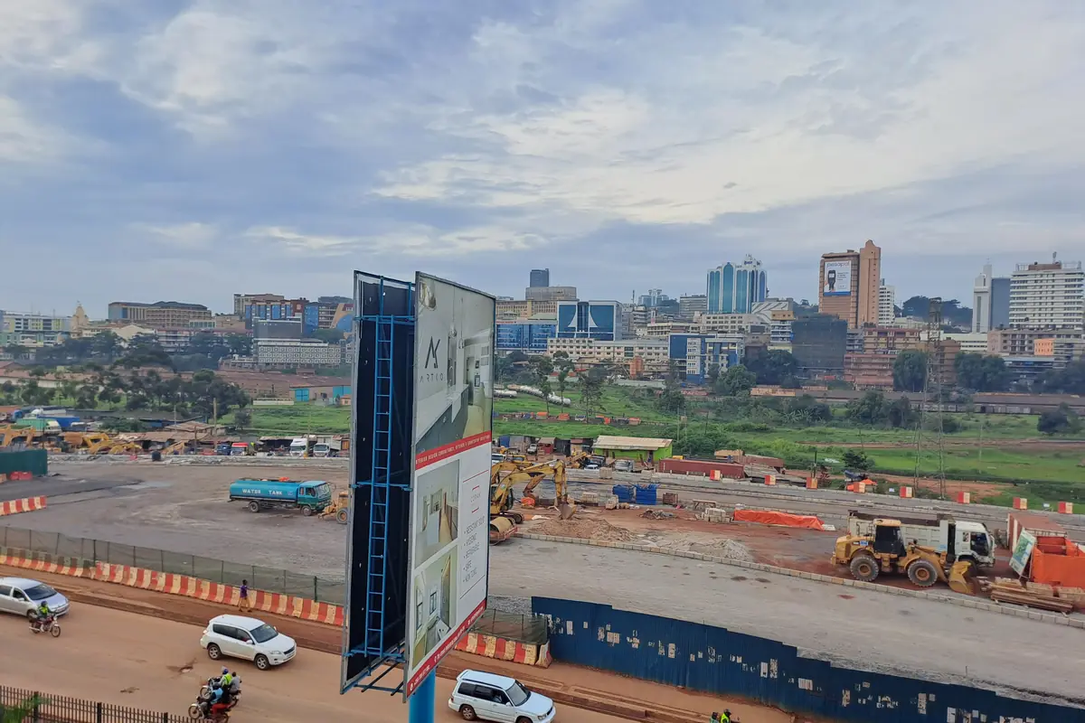 The Kampala skyline seen from Nsambya over a road under construction